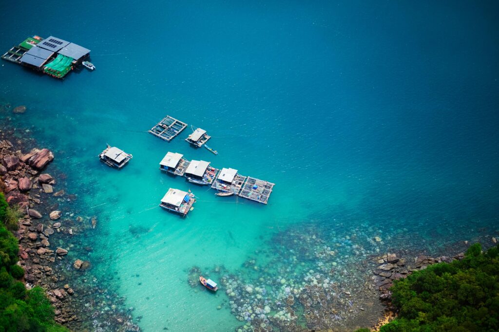 Stunning aerial shot of floating houses on the turquoise waters of Phu Quoc, Vietnam.